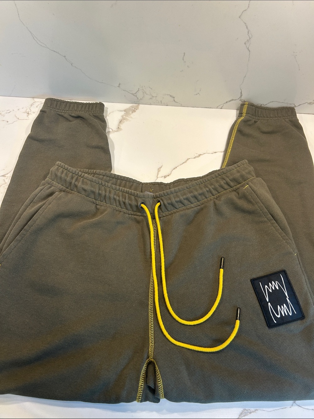 Puma Olive Green Joggers with Yellow Drawcord